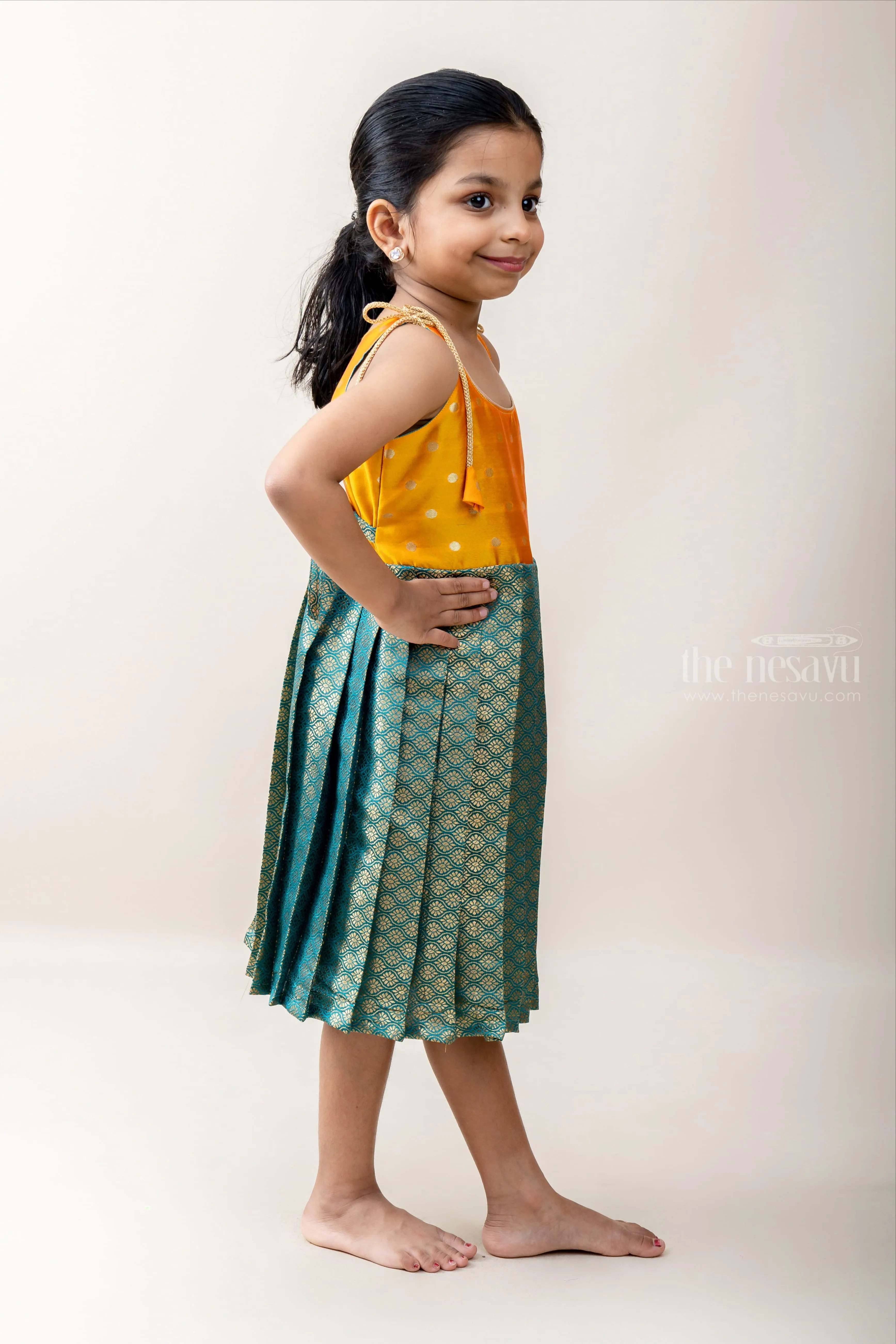 Dark Seagreen Banarasi Brocade Silk With Yellow Yoke Tie UP Frock.